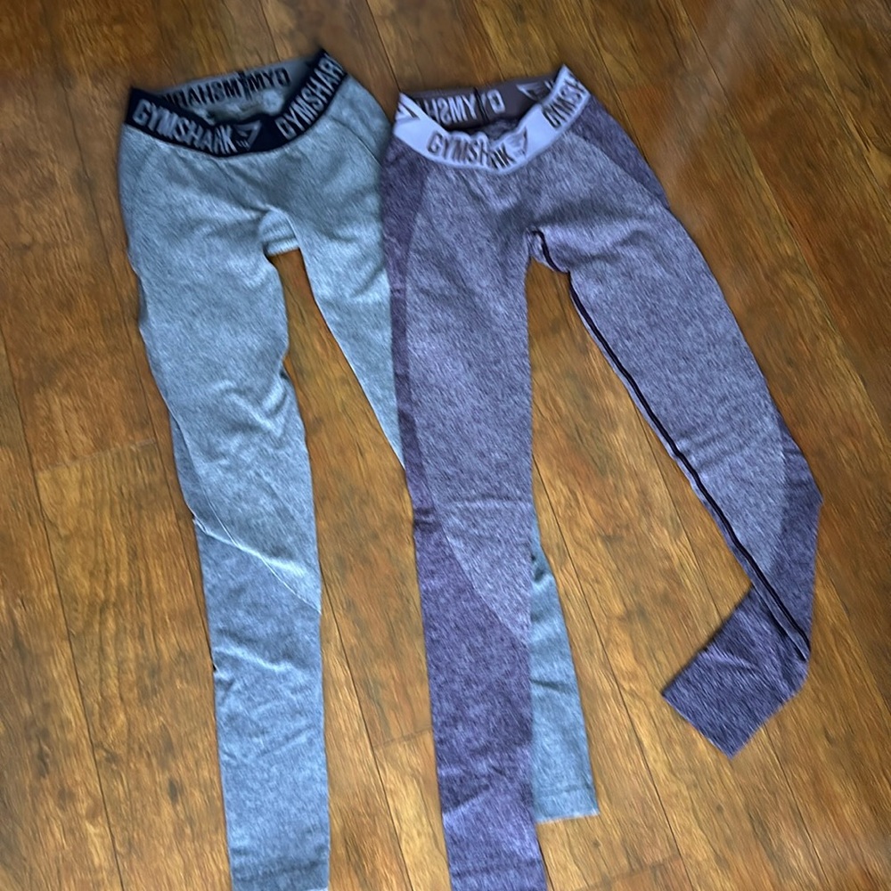 2 gym Shark leggings one is light purple and one grey